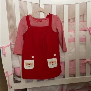 A Christmas corduroy jumper dress with onesie